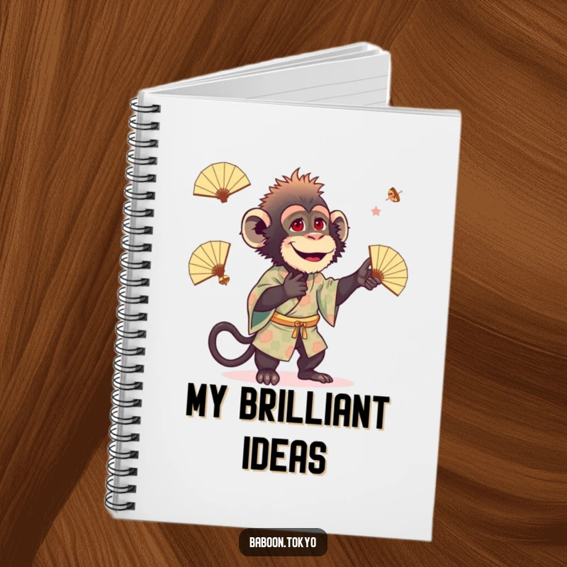 Funny baboon in a patterned kimono playfully juggling small fans, on a lined notebook cover, perfect for a funny gift.