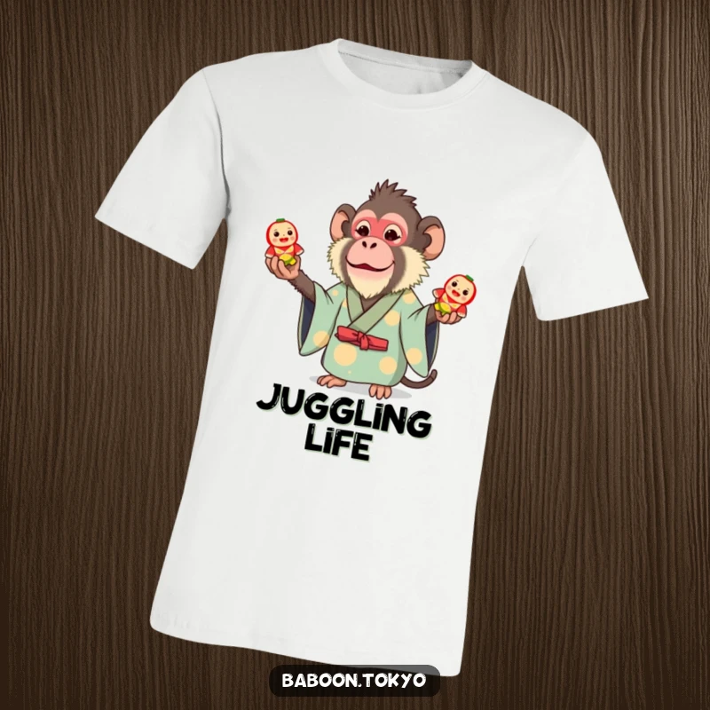 Funny t-shirt: a whimsical baboon in a bright, eye-catching kimono, skillfully juggling three small toy Daruma dolls with focus and flair.